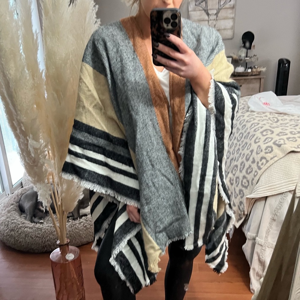 Boutique Poncho, shawl, striped pattern with tan, burnt orange, black, white